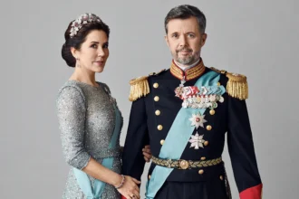 The danish king and and queen wearing their royal attire