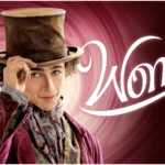 man with big hat and a purple swirl background with the word "Wonka"