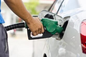 CAR POURING FUEL