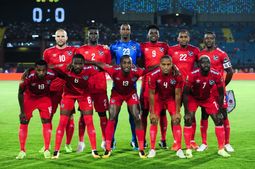 Players taking a team photo.