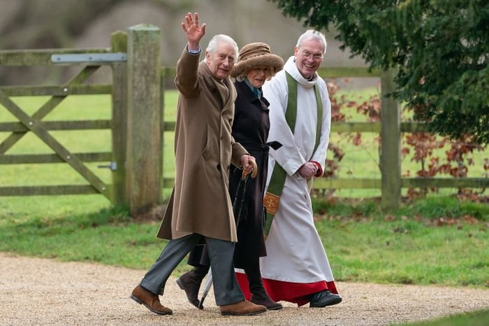 King Charles walking with wife and pope