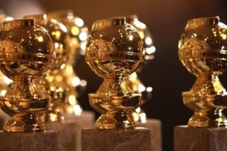 Three Golden Globe trophies