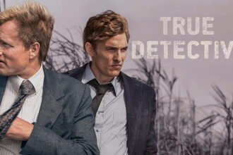 True detective poster with a cloudy enivironment, bare trees and two men walking